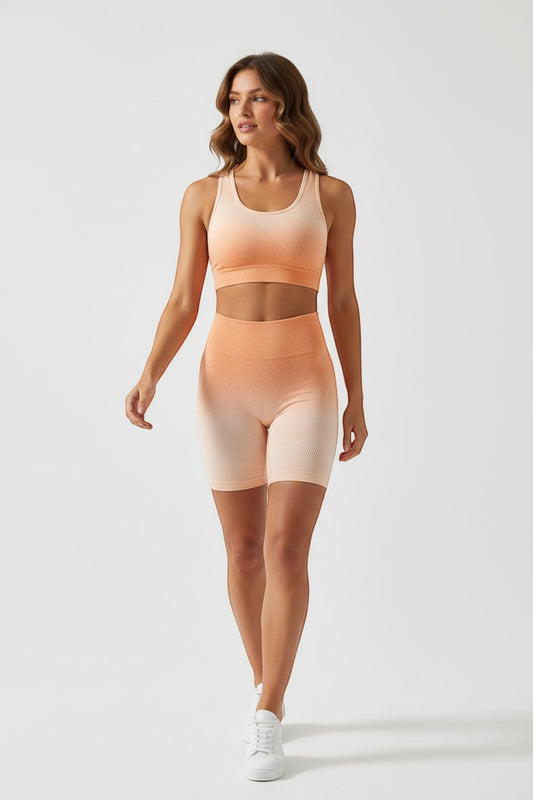 BOJUN women's seamless ombre crop top and high-waist biker shorts set in peach and cream.
